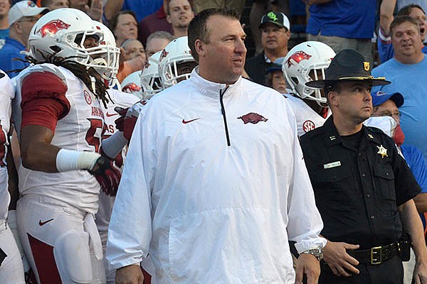 Arkansas coach Bret Bielema prepares to lead the Razorbacks onto the field at Ben Hill Griffin Stadium in Gainesville, Fla. 