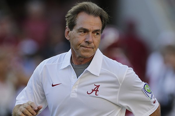 Alabama head coach Nick Saban watches his team prior to an NCAA college football game against Mississippi in Tuscaloosa, Ala., Saturday, Sept. 28, 2013. (AP Photo/Dave Martin)