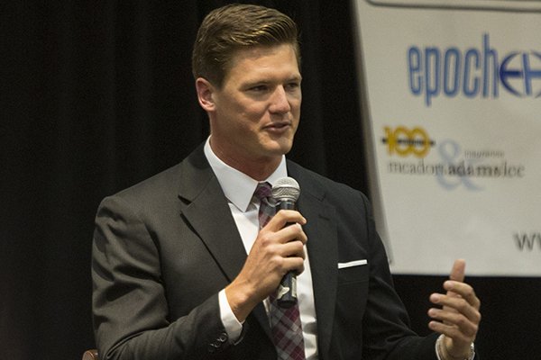 Former Arkansas Razorbacks QB Mitch Mustain talks to the touchdown club October 14, 2013 at the Embassy Suites in Little Rock.