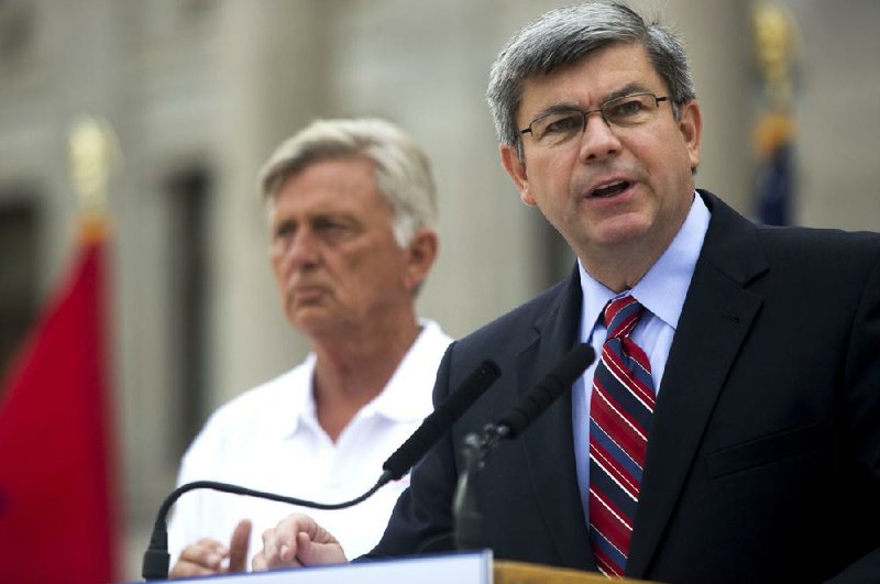 Arkansas Democrat-Gazette/MELISSA SUE GERRITS 08/17/13 -  Mike Ross, right, speaks to supporters after being endorsed for governor by current Governor Mike Beebe, left, August 17, 2013 at the state Capital. 