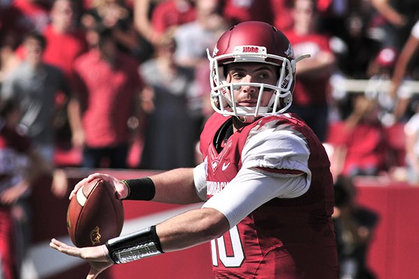 Arkansas quarterback Brandon Allen passes during the first half of an NCAA college football game against South Carolina in Fayetteville, Ark., Saturday, Oct. 12, 2013. (AP Photo/April L Brown)