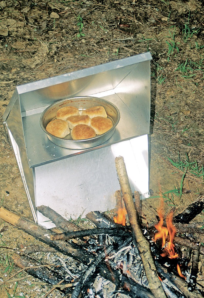 These biscuits cooked in less than 10 minutes in a reflector oven placed beside a blazing campfire. The cook does not need to wait for the fire to burn down to coals as with many cooking methods.