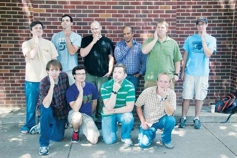A group of University of Central Arkansas Department of Biology graduate students and faculty pose almost seven weeks ago with clean-shaven faces. The men are competing for the best beard, with a deadline of Dec. 2. Contestants include, front row, from the left, Kyle Hurley, Tyler Button, Ben Rowley and Casey Cox; and back row, from the left, Greg Berbusse, Stephen Polaskey, Brad Moffitt, Arijit Mukherjee, Sage Shaddox and Garrett Grimes. Not pictured are Dave Barber and Andy Gray.