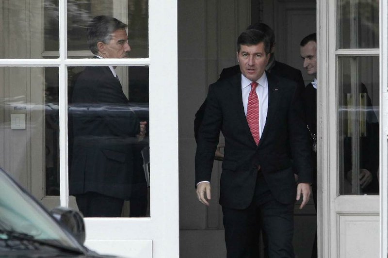 U.S Ambassador to France Charles H. Rivkin, right, leaves the Foreign Ministry in Paris, after he was summoned Monday, Oct. 21, 2013. The French government had summoned the ambassador to explain why the Americans spied on one of their closest allies. Le Monde newspaper said Monday, Oct. 21, 2013 that documents leaked by Edward Snowden show that the U.S. National Security Agency swept up 70.3 million French phone records in a 30-day period. (AP Photo/Claude Paris)