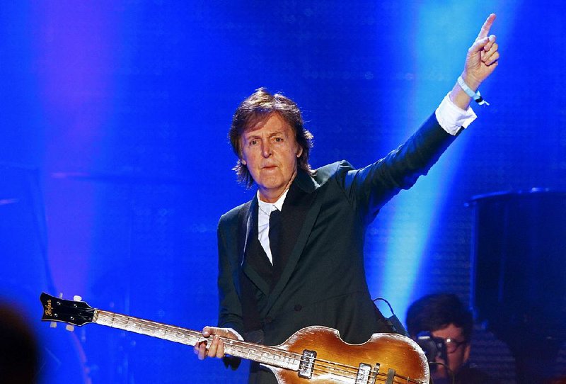 Paul McCartney gestures during a performance this summer at the Bonnaroo Music and Arts Festival in Manchester, Tenn. 
