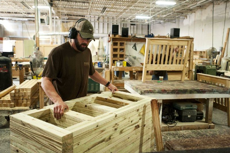 A Bunk & Loft employee stacks bunk-bed frames onto a cart at a factory in Columbus, Ohio, earlier this month. Orders for durable goods rose 3.7 percent in September, the Commerce Department said Friday. 