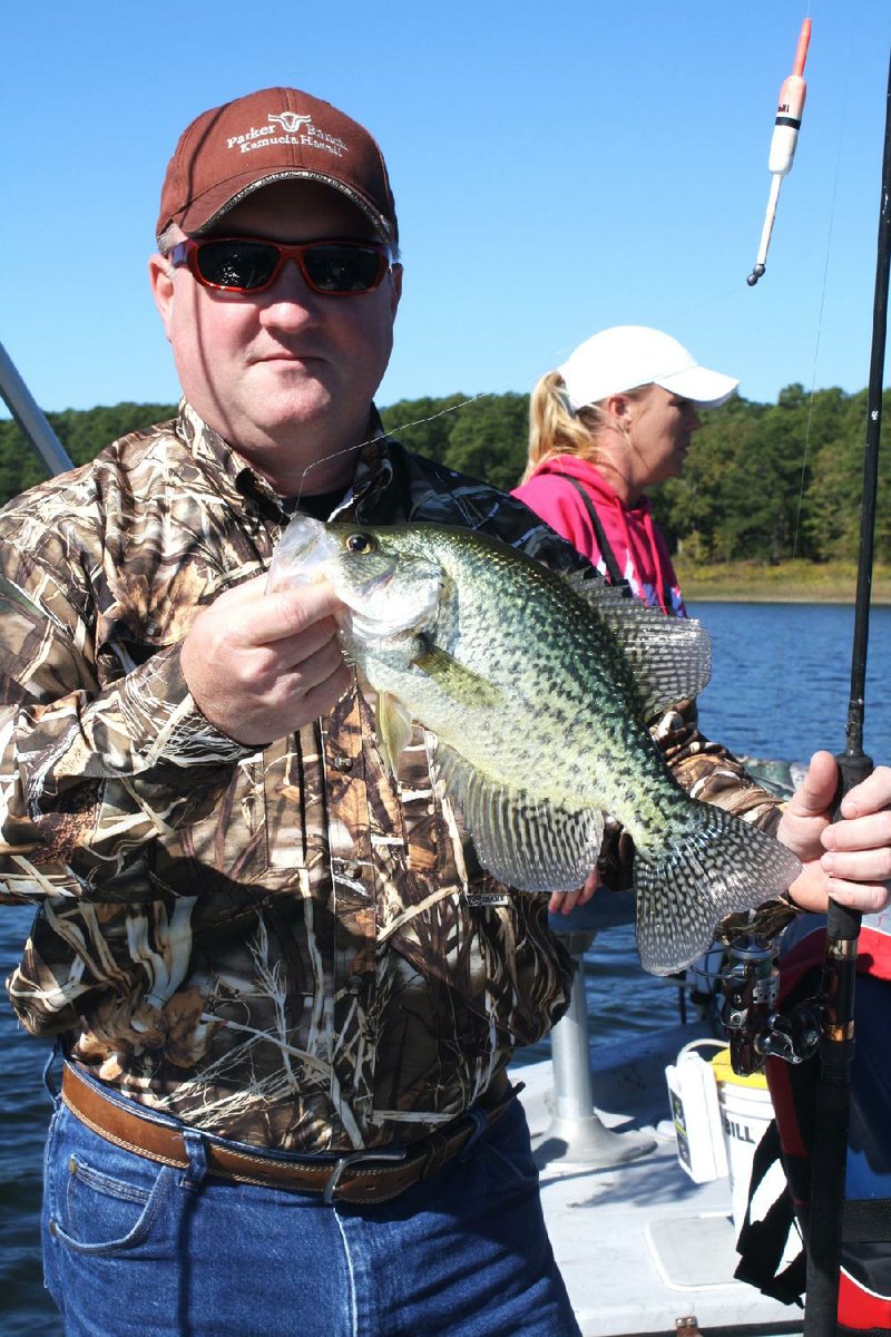 Arkansas Democrat-Gazette/BRYAN HENDRICKS
Grant Westmoreland of Sheridan shows off one of the 30 crappie caught Tuesdaywhile fishing on DeGray Lake.
