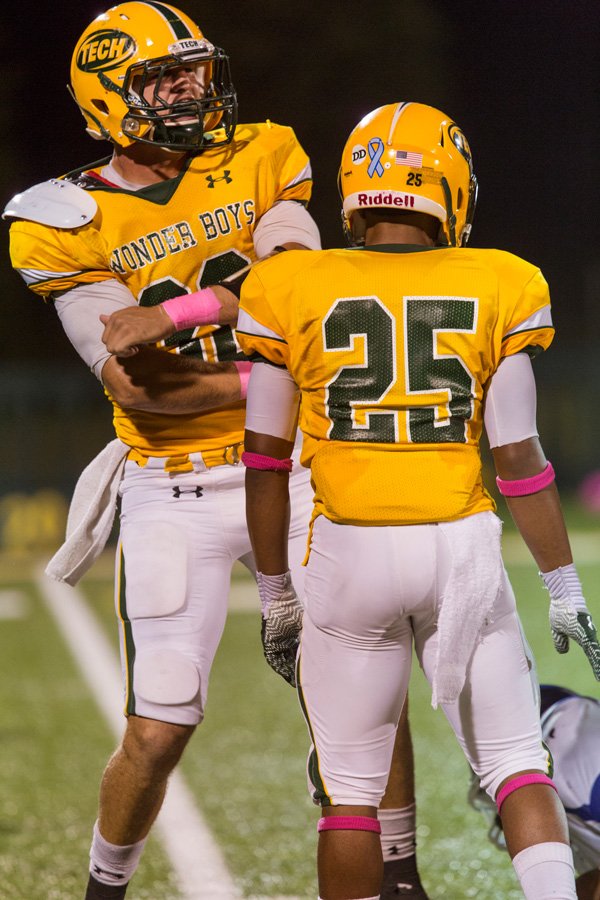 Former West Fork standout Logan Genz, left, shown celebrating a tackle during Arkansas Tech's victory over Southern Arkansas on Oct. 10 in Russellville, is the Wonder Boys' leading tackler with 67 through seven games and set a school record earlier this month when he recorded 24 tackles in a game at Arkansas-Monticello.