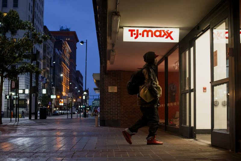 A man enters a TJ Maxx store last week in Cincinnati. The Commerce Department said Tuesday that retail sales climbed in September. 