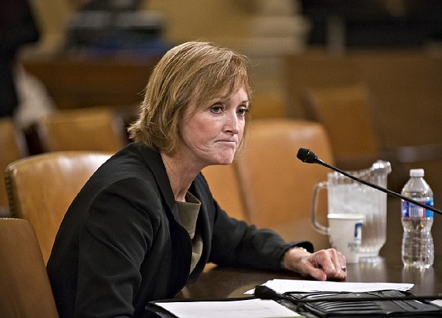 Marilyn Tavenner, the administrator of the Centers for Medicare and Medicaid Services, testifies Tuesday before the House Ways and Means Committee at a hearing on the implementation of the Patient Protection and Affordable Care Act on Capitol Hill in Washington. 