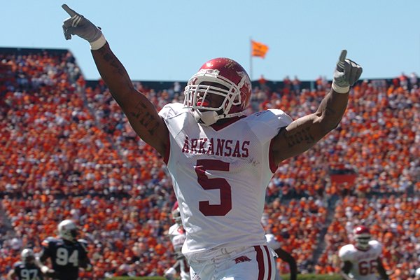 Arkansas running back Darren McFadden celebrates after a 63-yard touchdown run in the second quarter of a 27-10 win over No. 2 Auburn on Oct. 7, 2006 at Jordan Hare Stadium in Auburn, Ala. Arkansas running back Darren McFadden celebrates after a 63-yard touchdown run in the second quarter of a 27-10 win over No. 2 Auburn on Oct. 7, 2006 at Jordan Hare Stadium in Auburn, Ala.