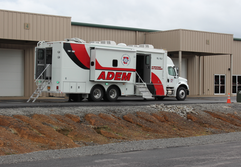 The Arkansas Department of Emergency Management mobile command unit is parked in front of the Conway Expo Center Thursday during a drill simulating how the state would accept out-of-state aid during a hurricane.