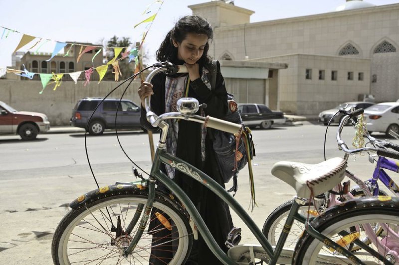 Waad Mohammed appears as the title character in Wadjda, playing a 10-year-old Saudi girl who challenges deep-rooted traditions in a determined quest to buy a bicycle. 