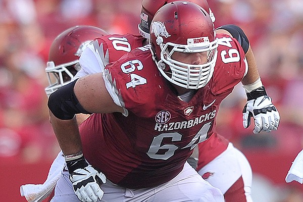 Arkansas center Travis Swanson during an Aug. 31, 2013 game against Louisiana-Lafayette at Razorback Stadium in Fayetteville. 