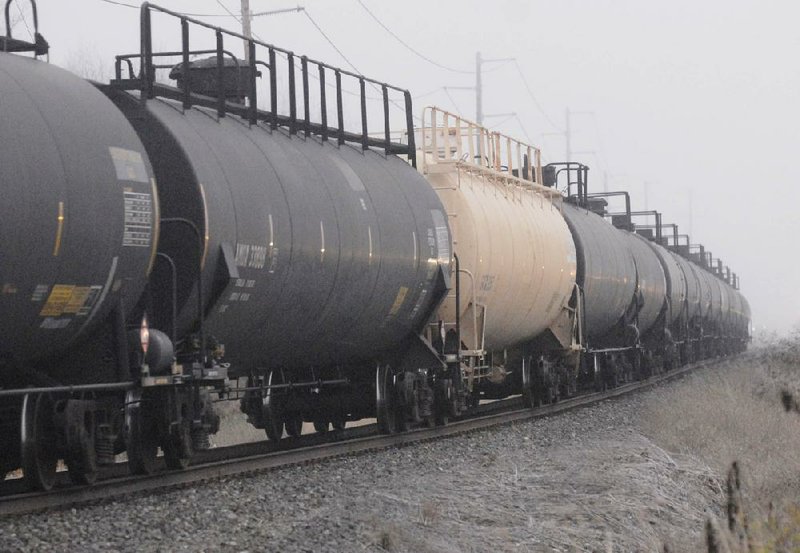 Tank cars of the type used to transport crude oil from North Dakota head toward a refinery in Anacortes, Wash. Faced with a lack of pipeline capacity, Canadian oil producers want to ship more of their product south via rail lines. 