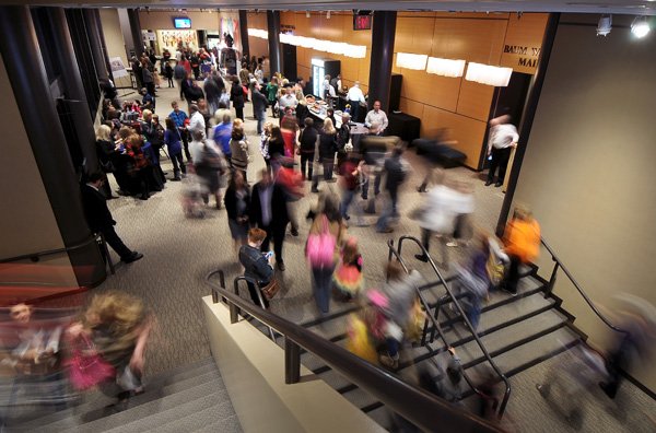 The main lobby of the Walton Arts Center in Fayetteville fills up as people arrive for a production of Disney's 'Beauty and the Beast' on Friday October 18, 2013. Plans exist to expand the lobby, in order to better accommodate crowds at large events, if a November 12 special election approves the funding.