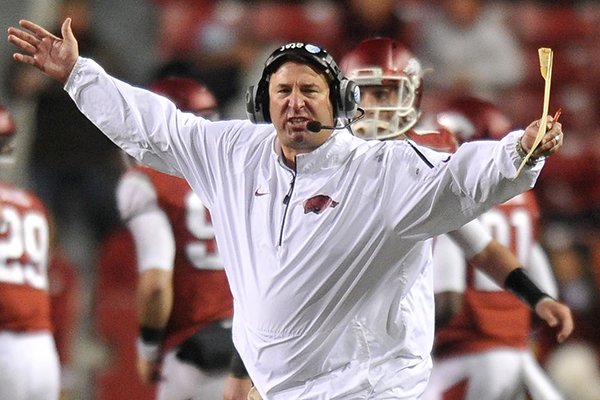 Arkansas coach Bret Bielema reacts after a offensive pass interference call in the fourth quarter of Saturday night's game at Razorback Stadium in Fayetteville.
