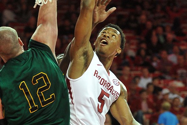Arkansas guard Anthlon Bell goes for a lay-up during the second half of a Nov. 1, 2013 exhibition game against Missouri Southern at Bud Walton Arena. 