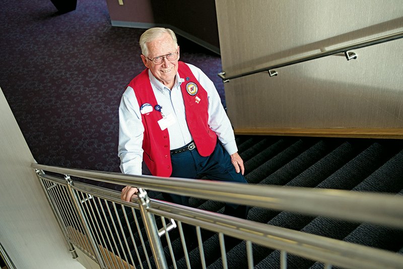 Fred Picker, 82, volunteers for White County Medical Center as a messenger. He has been keeping track of the amount of stairs he climbs there and has recently finished climbing steps equal to the height of Mount Everest.