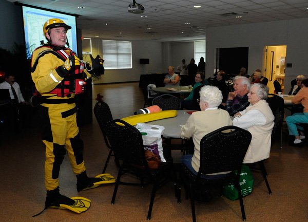 SWIFT-WATER RESPONDER
Mark Clippinger wears his water rescue gear during his flood-event safety presentation on Thursday Nov. 14 2013 at the Seniors and Law Enforcement Together event at the Rogers Adult Wellness Center. Clippinger is a swift-water rescue instructor and the superintendent at Hobbs State Park-Conservation Area.