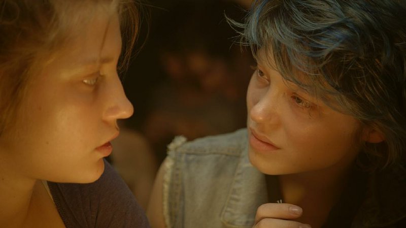Adele (Adele Exarchopolous) becomes fascinated with blue-haired Emma (Lea Seydoux) in Blue Is the Warmest Color. 