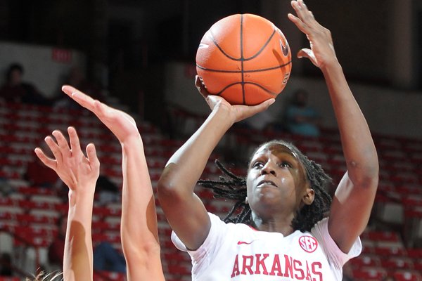 Arkansas guard Keira Peak, goes up for a shot Sunday, Nov. 24, 2013, during the second half of the game against Western Michigan at Bud Walton Arena in Fayetteville. Arkansas beat Western Michigan, 61-46.