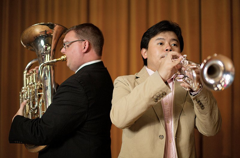 Christian Carichner, left, and Eric Liu will perform solos Tuesday in the UCA Wind Ensemble and Symphonic Band concert at the Donald W. Reynolds Performance Hall.