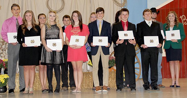   Submitted Photo 
Benton County 4-H Scholarship Recipients were: Samantha Lambert (front, left), Brooke Belts, Kirby Romines, Carson Alsup, Noah Smith, Joshua Lockhart, Faith Bomstad, Howie Stettmeier (back, left), Kaia Gossman, Tyler Hamilton, Ashley Jackson, Jennifer Isgrigg and Levi Bingham.