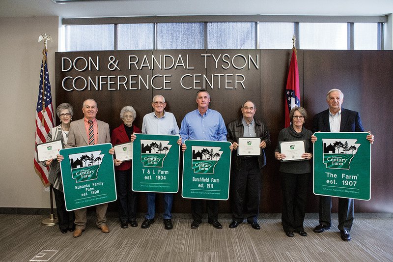 Several families from the River Valley & Ozark Edition coverage area have been designated Arkansas Century Farms. Among them are, from the left, Caroline and Larry Eubanks of Van Buren County; Lois and Charles “Toby” Torbert of Conway County; Travis Burchfield and his dad, O.D. Burchfield, of Faulkner County; and Sara and Dan Flowers of Van Buren County.