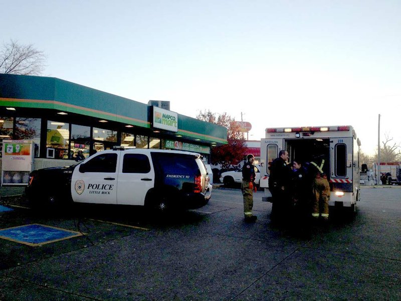 Little Rock authorities respond to the Mapco Mart at 5420 W. 12th St., where employees reported that a man had run in from across the street saying he had been shot in the face and side.