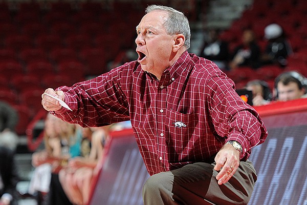 Tom Collen, Arkansas women's basketball head coach, yells from the bench Sunday, Nov. 24, 2013, during the second half of the game against Western Michigan at Bud Walton Arena in Fayetteville. 