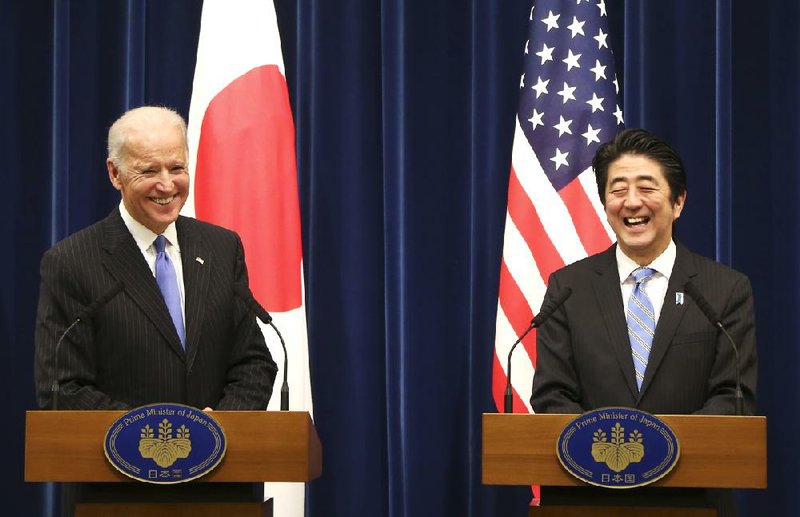 U.S. Vice President Joe Biden and Japanese Prime Minister Shinzo Abe hold a joint news conference after their meeting at Abe’s official residence Tuesday in Tokyo. 