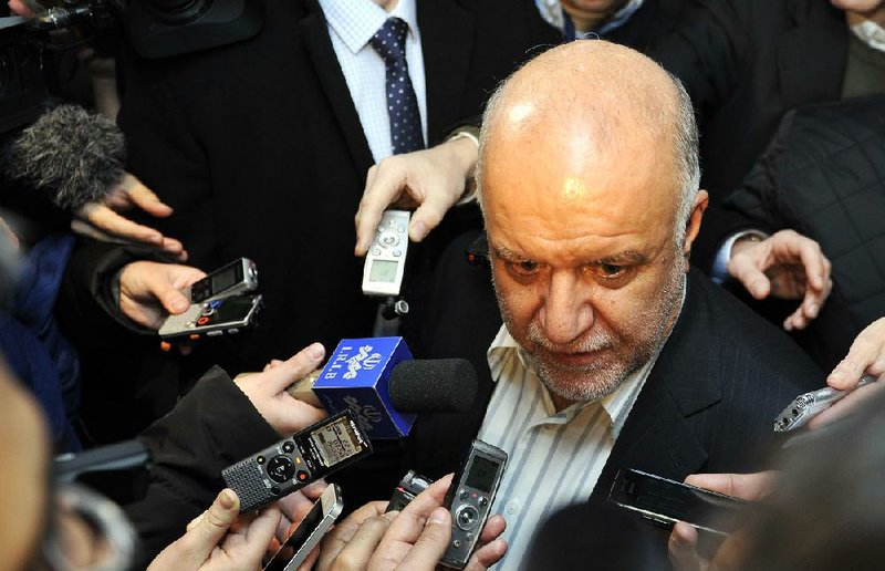 Iran’s Minister of Petroleum Bijan Namdar Zangeneh talks to reporters as he arrives Tuesday in Vienna ahead of today’s meeting of the Organization of Petroleum Exporting Countries. 