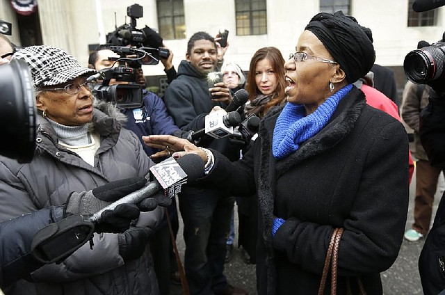 Cecily McClellan, a Detroit public retiree, speaks out Tuesday against the ruling allowing Detroit’s bankruptcy plan to proceed. The ruling turned aside objections from unions, pension funds and retirees who stand to lose benefits. 