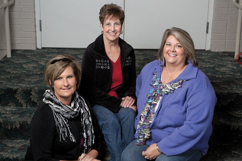 From the left, Tammy Tompkins, Helen Jones and Cheryl Moore are volunteers for the Cabot Christmas Alliance, a ministry group of churches in the Cabot School District that provide a Christmas meal for those in need in the area.