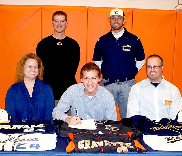 Photo by Dodie Evans 
Aaron Means, fielder and pitcher with the Gravette Lion baseball team, signs with Ecclesia College in Springdale.
