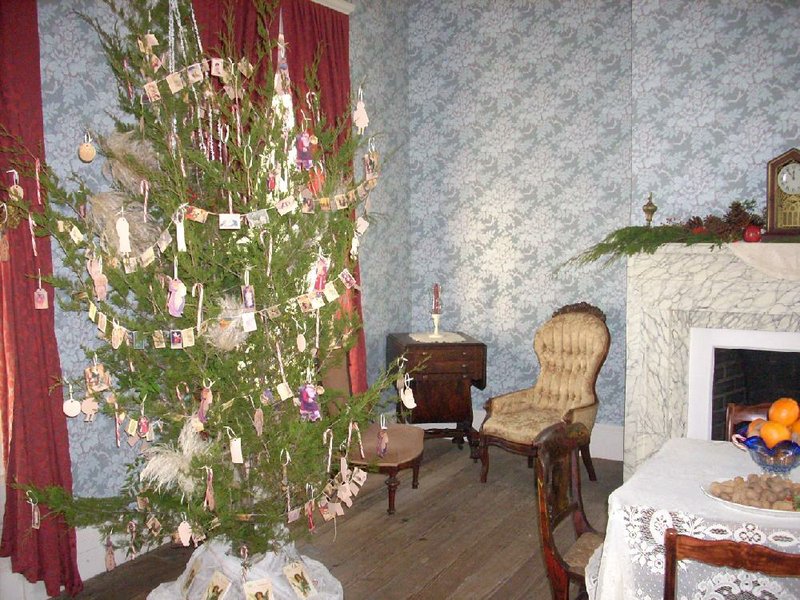 Houses in Historic Washington State Park are decked out in traditional Victorian finery for the annual Christmas and Candlelight celebration. 
          
