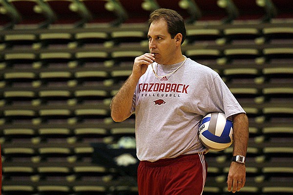 Arkansas volleyball coach Robert Pulliza watches a 2009 practice at Barnhill Arena in Fayetteville. 