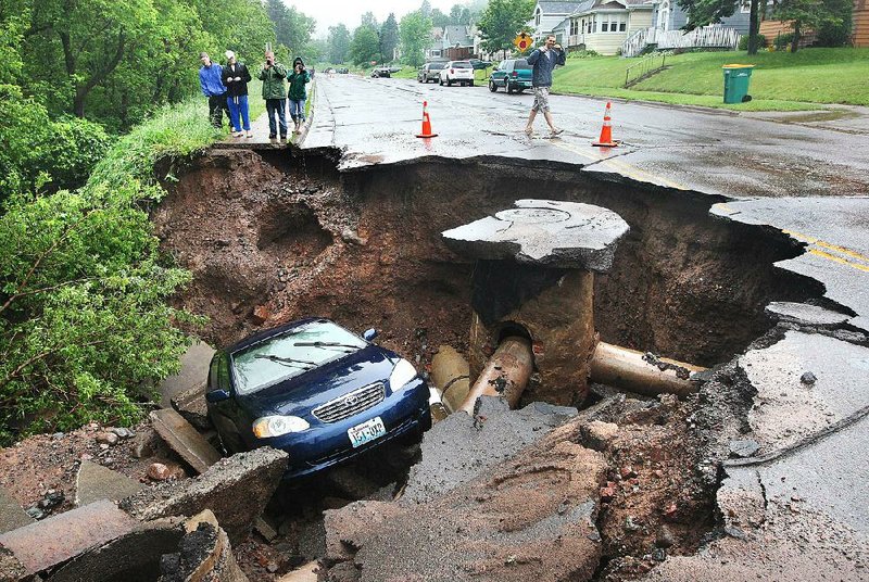 A recent pothole near Allsopp Park causes some problems for Little Rock traffic. 