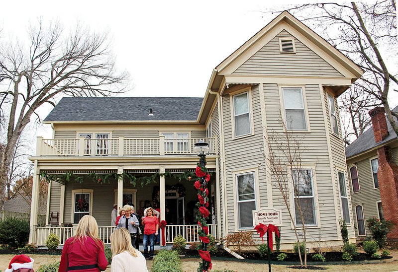 Attendees of the Christmas Tour of Historic Homes leave the former home of Lucretia “Lutie” Maxfield Wilson, a Batesville resident who kept a Civil War diary that included accounts of the military occupations and actions in and around Batesville.