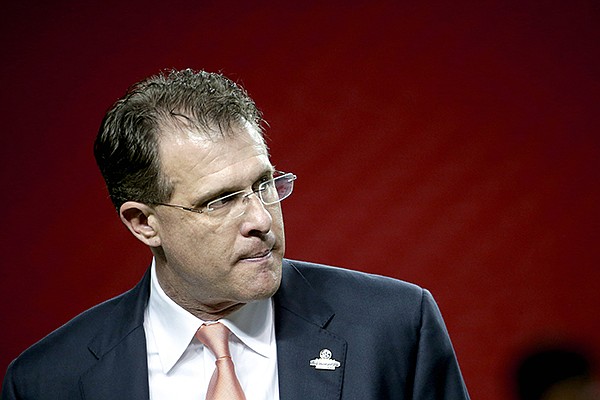 Auburn head coach Gus Malzahn walks on the field during practice ahead of Saturday's Southeastern Conference championship college football game against Missouri, Friday, Dec. 6, 2013, in Atlanta. (AP Photo/David Goldman)