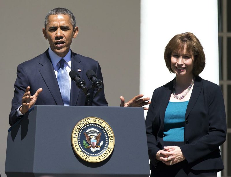 President Barack Obama introduces Patricia Millett in June as his nominee to join the U.S. Court of Appeals for the District of Columbia. Her nomination was approved Tuesday. 