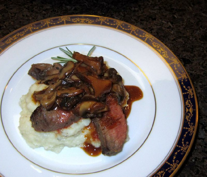 A recent Savory Spoon wild-game dinner featured five small plates, including this bison sirloin over a cauliflower-celery root puree with a wild mushroom demi-glace and rosemary garnish. 