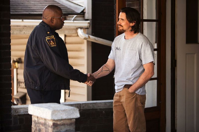 M 216  (Left to right.) Forest Whitaker and Christian Bale star in Relativity Media’s Out of the Furnace.
Photo Credit: Kerry Hayes
© 2012 Relativity Media.
