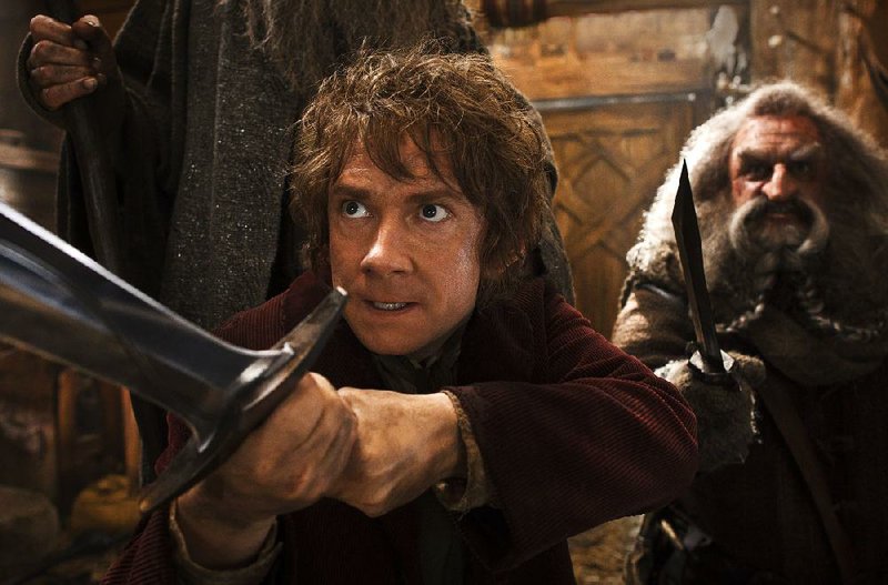 Caption: (L-r) MARTIN FREEMAN as Bilbo and JOHN CALLEN as Oin in the fantasy adventure "THE HOBBIT: THE DESOLATION OF SMAUG," a production of New Line Cinema and Metro-Goldwyn-Mayer Pictures (MGM), released by Warner Bros. Pictures and MGM.