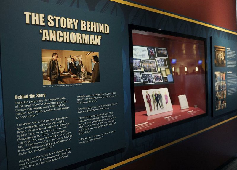 In addition to Ron Burgundy’s suit, displayed in a revolving case, the Newseum also exhibits his
flute, mustache brush and a reporter’s “Sex Panther” cologne. 