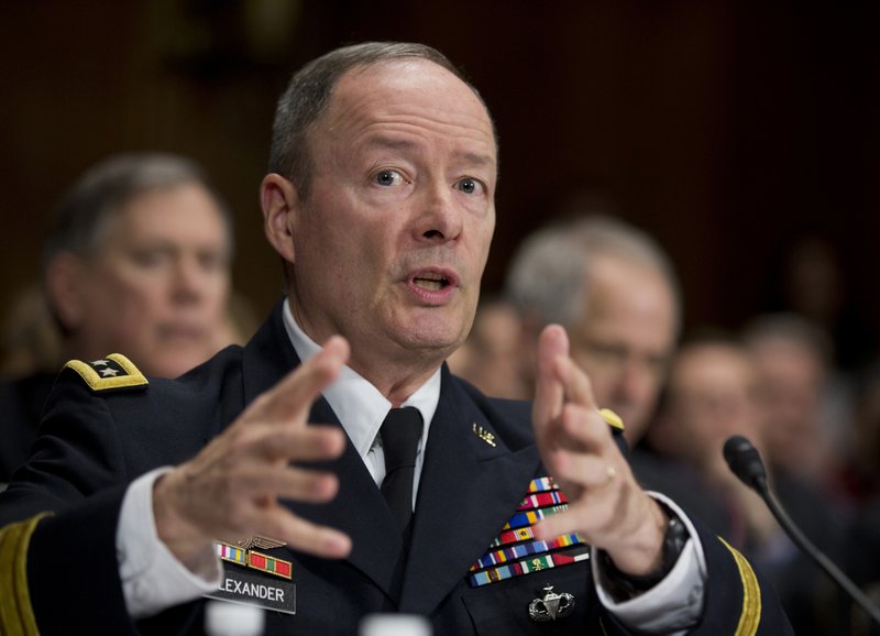 According to a former government official, Gen. Keith Alexander (above), the National Security Agency director, said that at the time Edward Snowden was downloading secret documents, the agency was months away from installing software that would have detected the activity. 