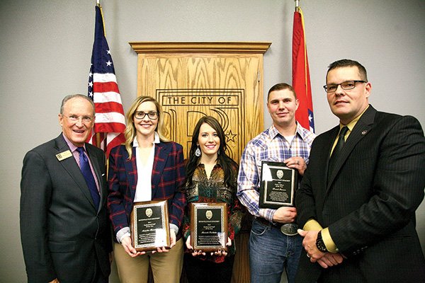 STAFF PHOTO MELISSA GUTE 
The Bentonville Police Department recognized its 2013 Officer of the Year and Civilians of Year recipients during a reception on Monday at the police department. Pictured from left, Bentonville Mayor Bob McCaslin, 2013 Civilians of the Year Kristin Barnes and Moriah Sartain, 2013 Officer of the Year Brent Farrer and Bentonville Police Chief Jon Simpson.
