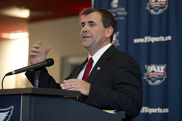 Charlie Partridge speaks during a news conference where he was introduced as the new NCAA college football coach at Florida Atlantic University, Tuesday, Dec. 17, 2013 in Boca Raton, Fla. Partridge served as assistant head coach and defensive line coach at Arkansas last season. (AP Photo/J Pat Carter)