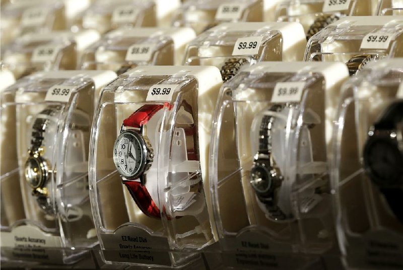 Watches are displayed at a Kmart store in New York on Thanksgiving. There were no signs of retail inflation in consumer prices in November, the Labor Department said. 